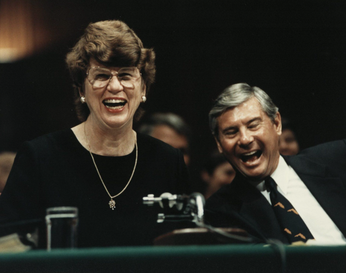 Janet Reno and Bob Graham sit laughing during one of her Senate confirmation hearings