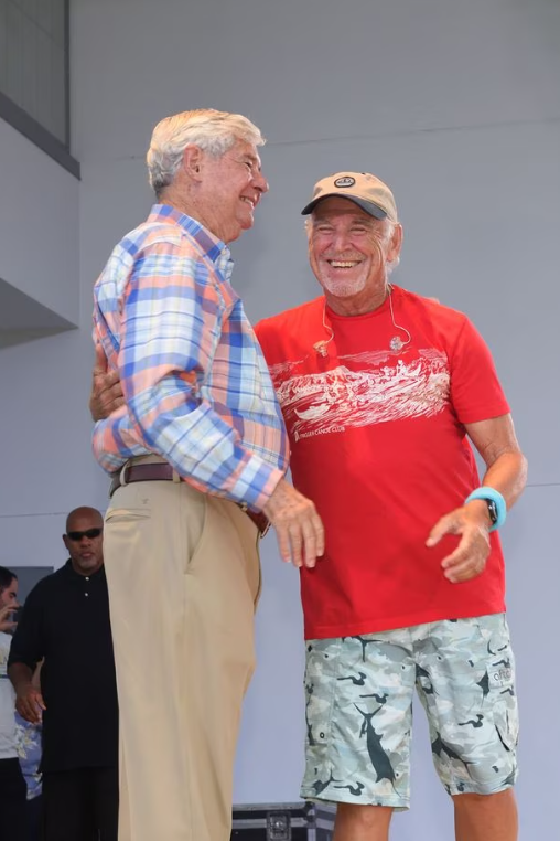 Jimmy Buffett and Bob Graham on stage at a concert organized by Buffett and the Coral Reefer Band in support of Graham's daughter, former Rep. Gwen Graham. Hollywood Arts Park Amphitheater, Hollywood, Florida. Aug, 23, 2018.